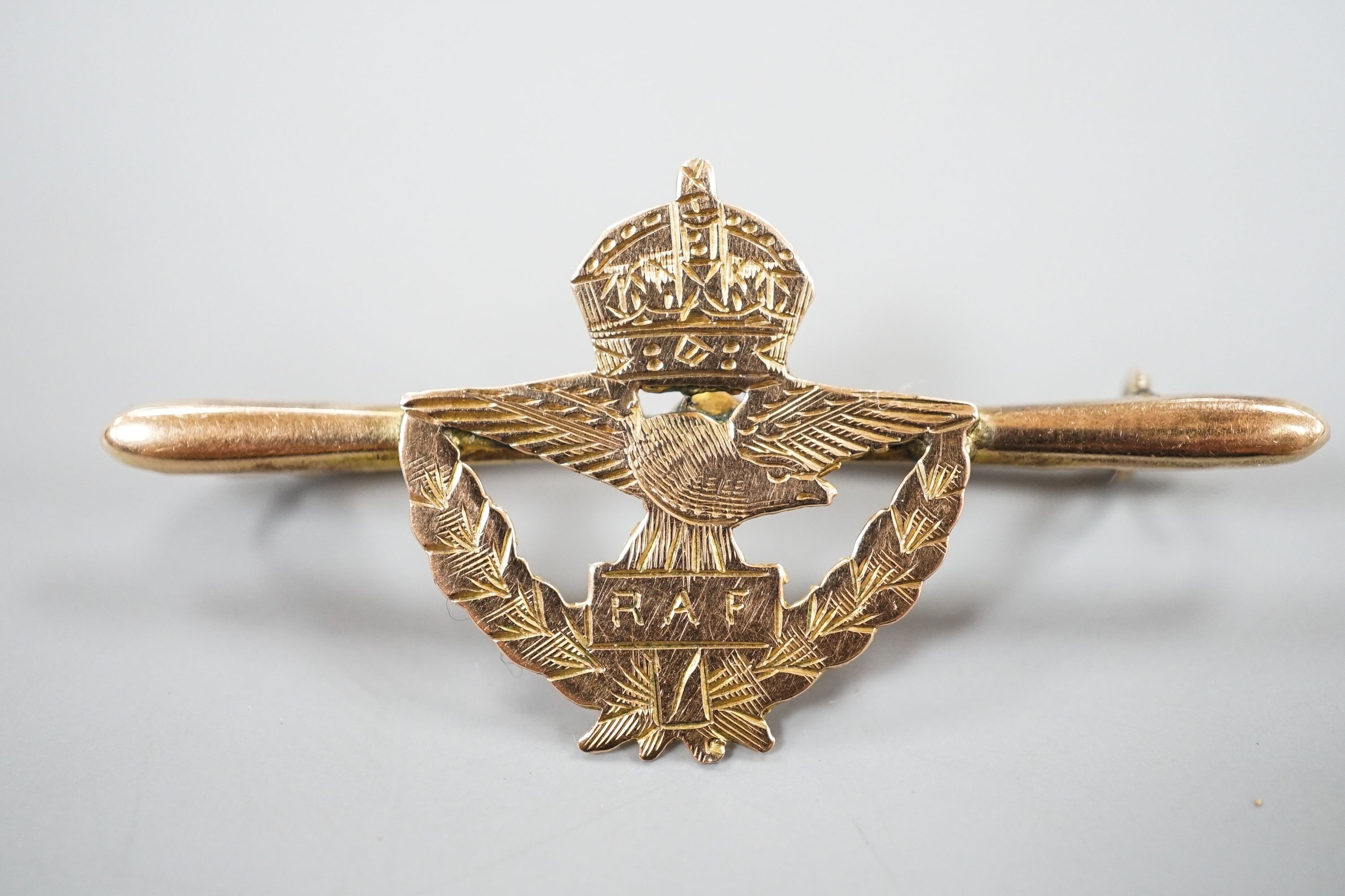A WW2 period hand engraved 9ct yellow metal RAF sweetheart's brooch, 44mm, 2.4 grams.